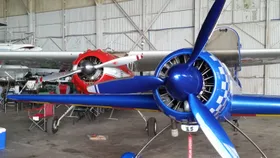 a couple of planes in a hangar